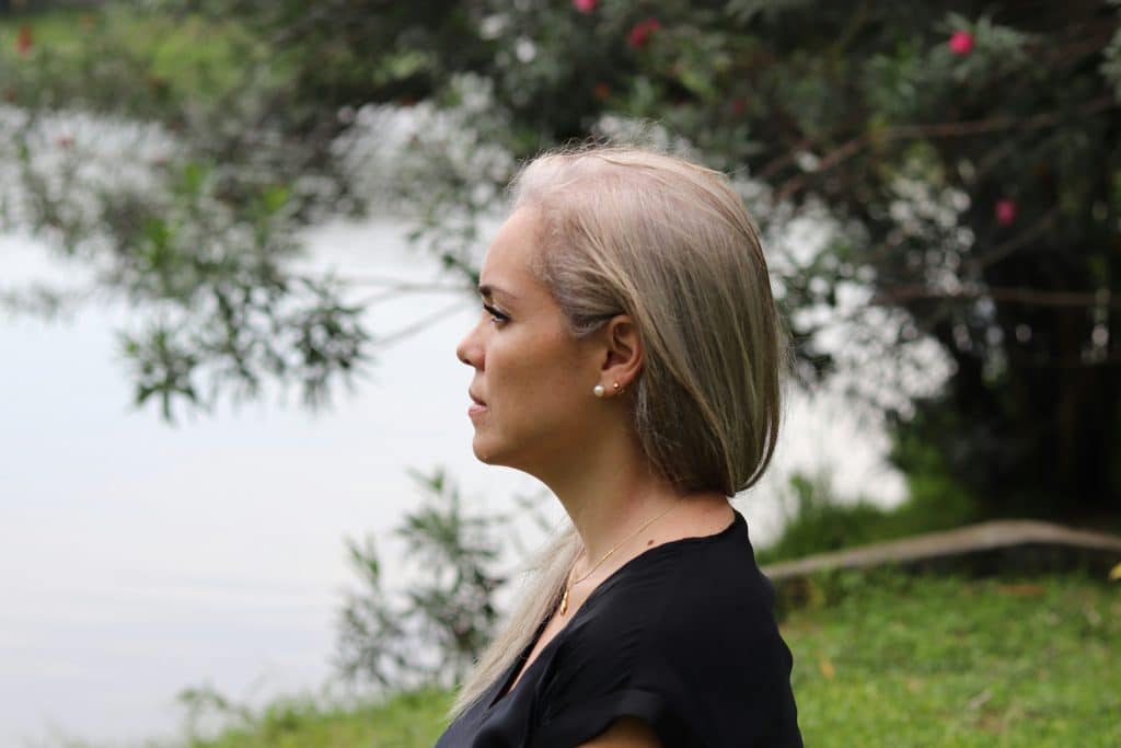 older woman looking over the lake