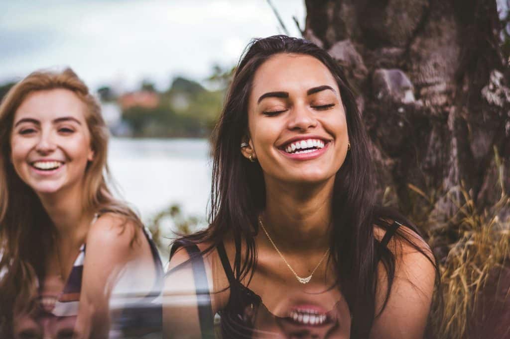 women smiling together
