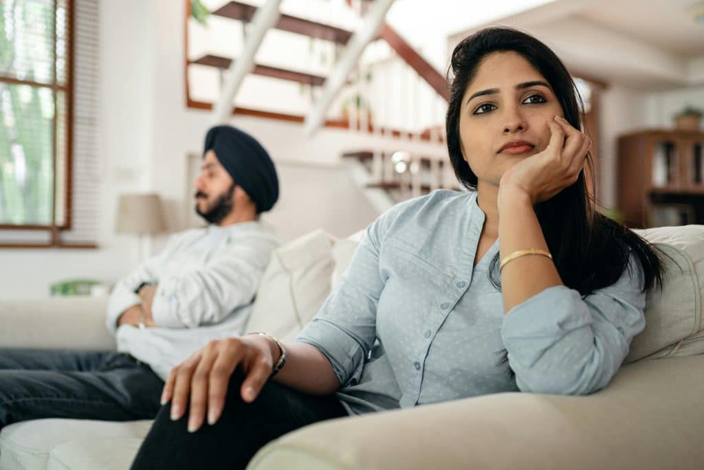woman ignoring husband