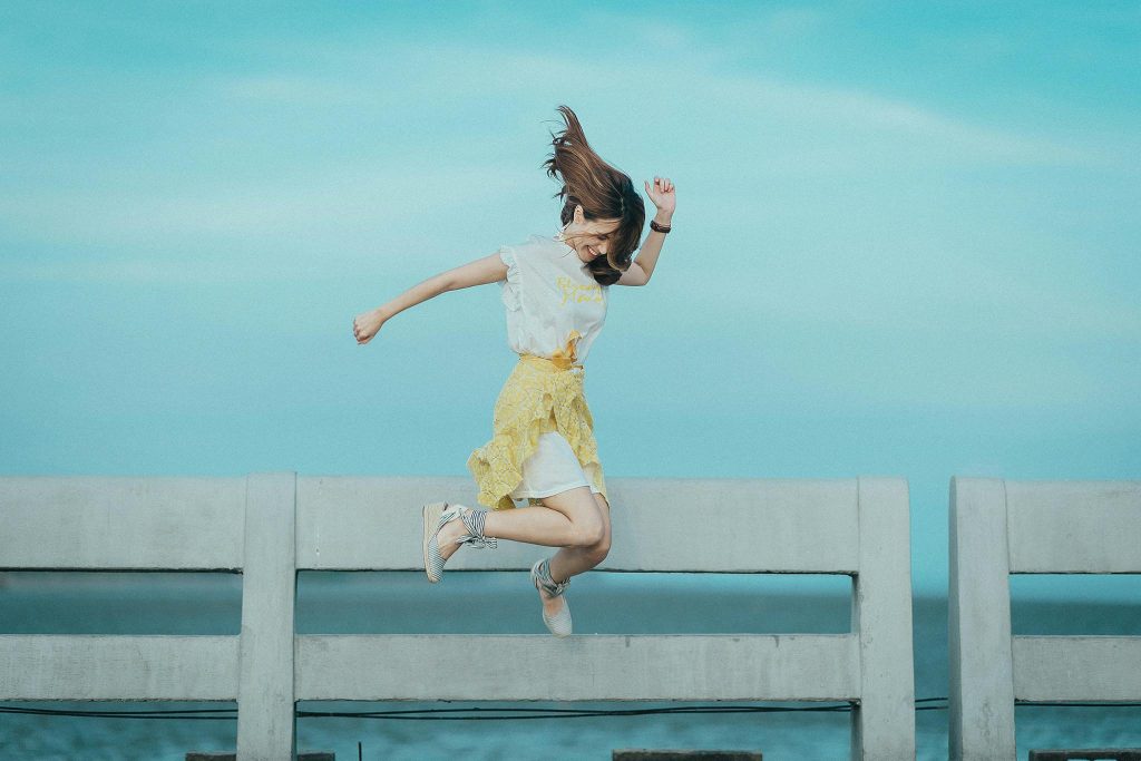 woman jumping for joy