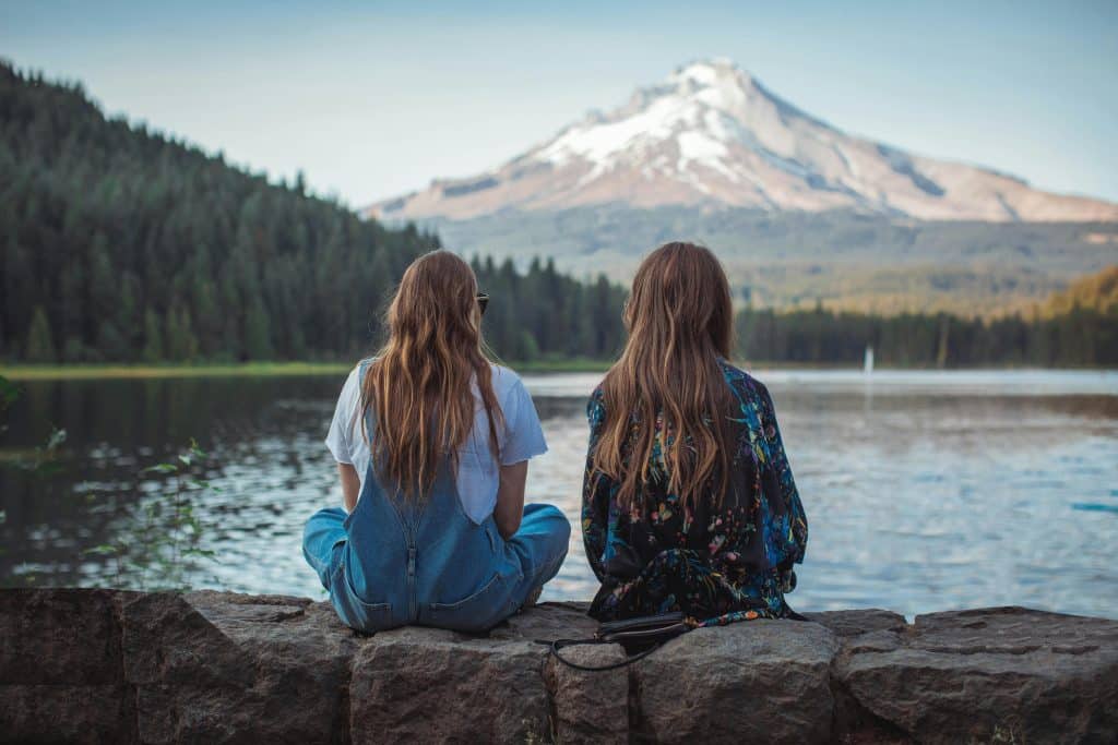 two women looking out over the lake