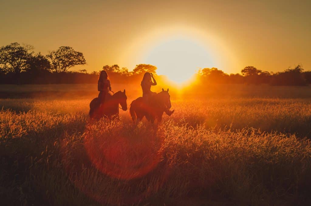 women riding horses